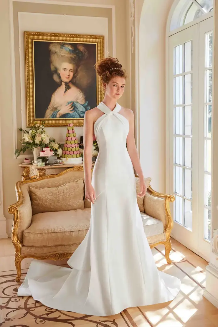a bride in her wedding dress in an elegant room