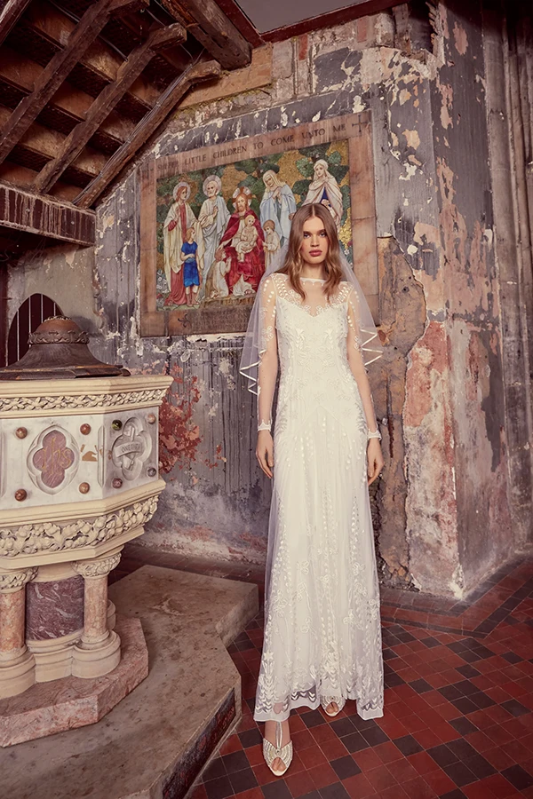 Temperley London wedding Dress worn by woman in a church setting