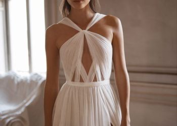 a bride in a stunning revealing dress